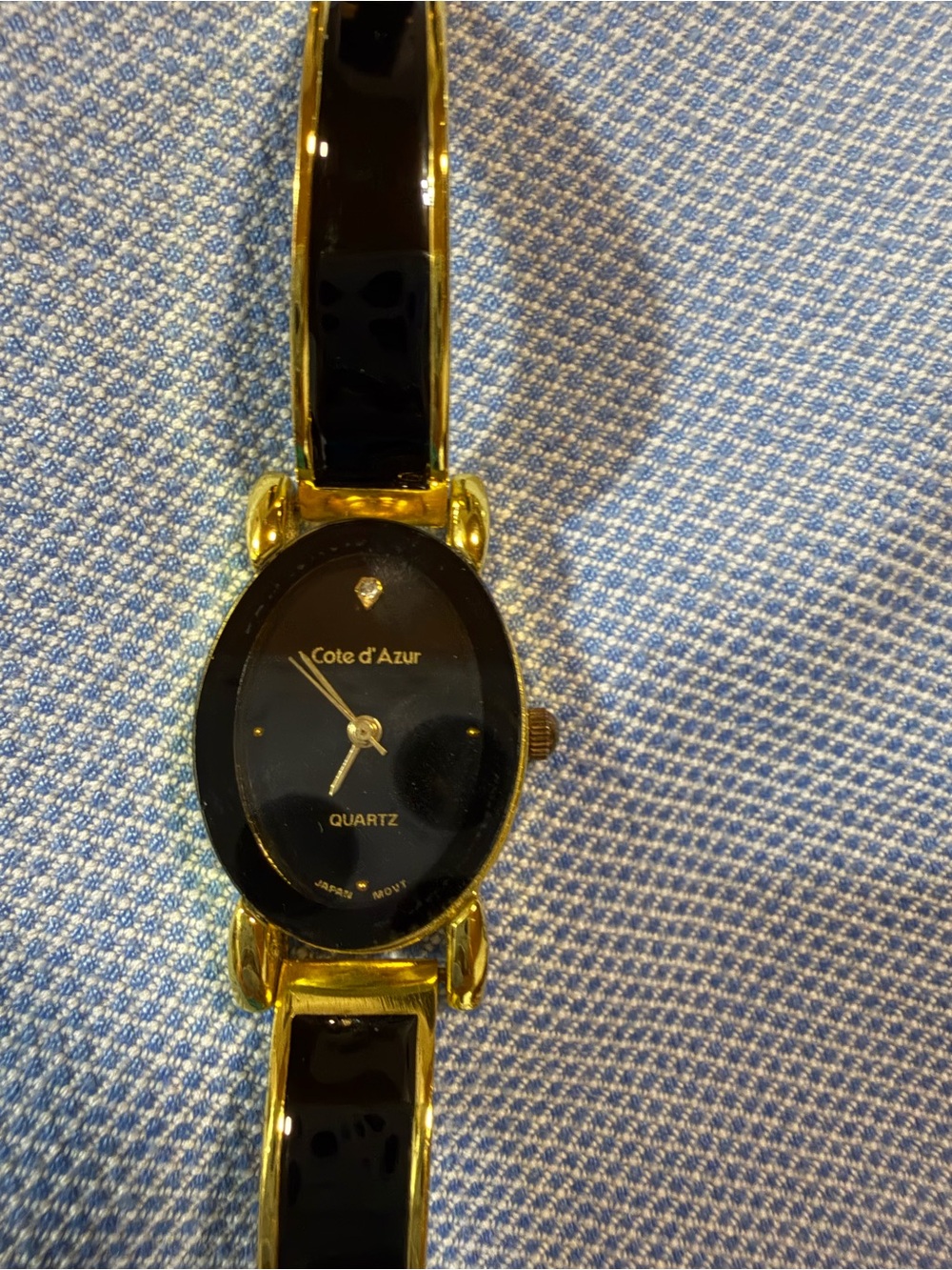 Cote d'Azur Black & Gold Bangle Quartz Watch. Battery not included